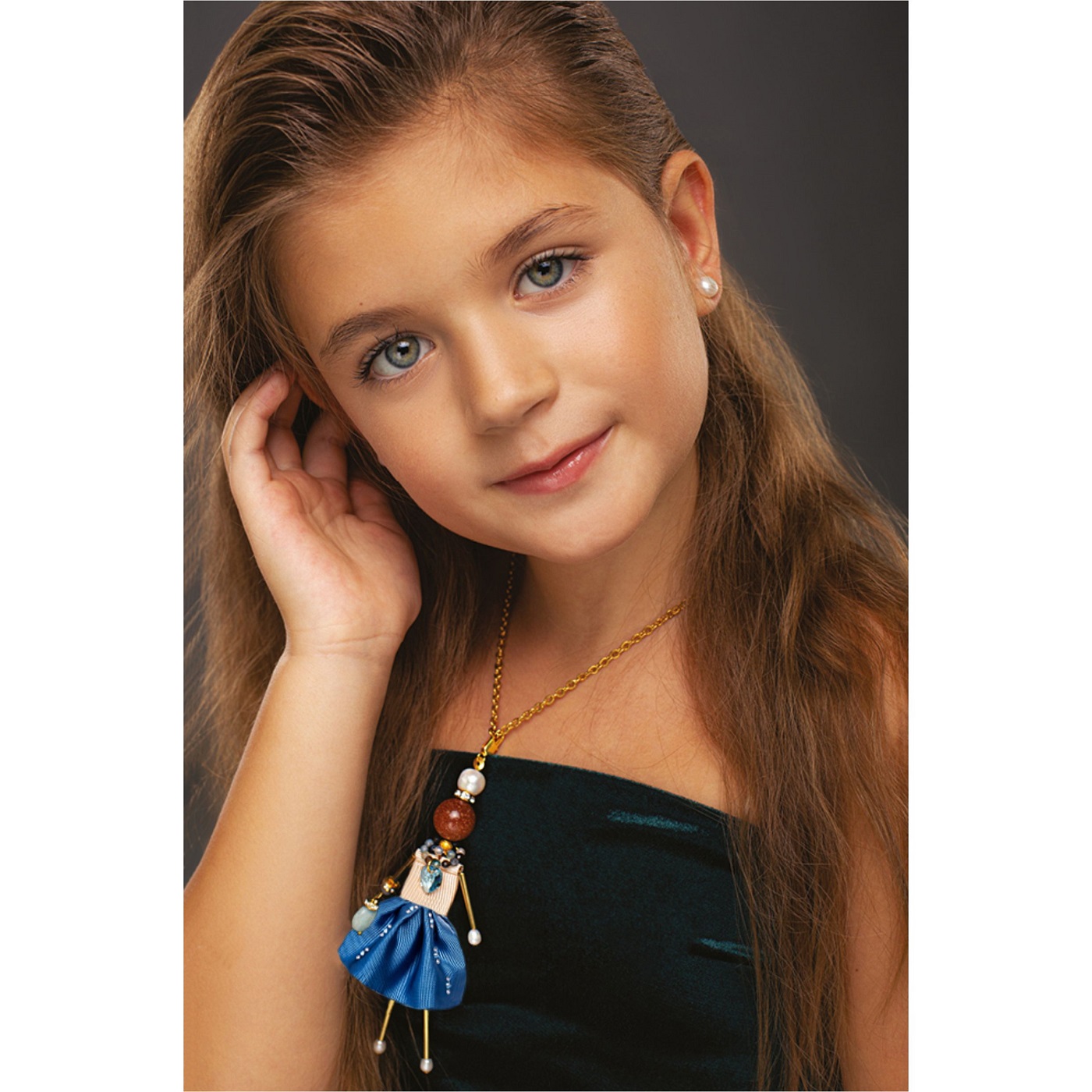 little lady with “Malachite Box” doll pendant — golden sand, pearls, and aquamarine