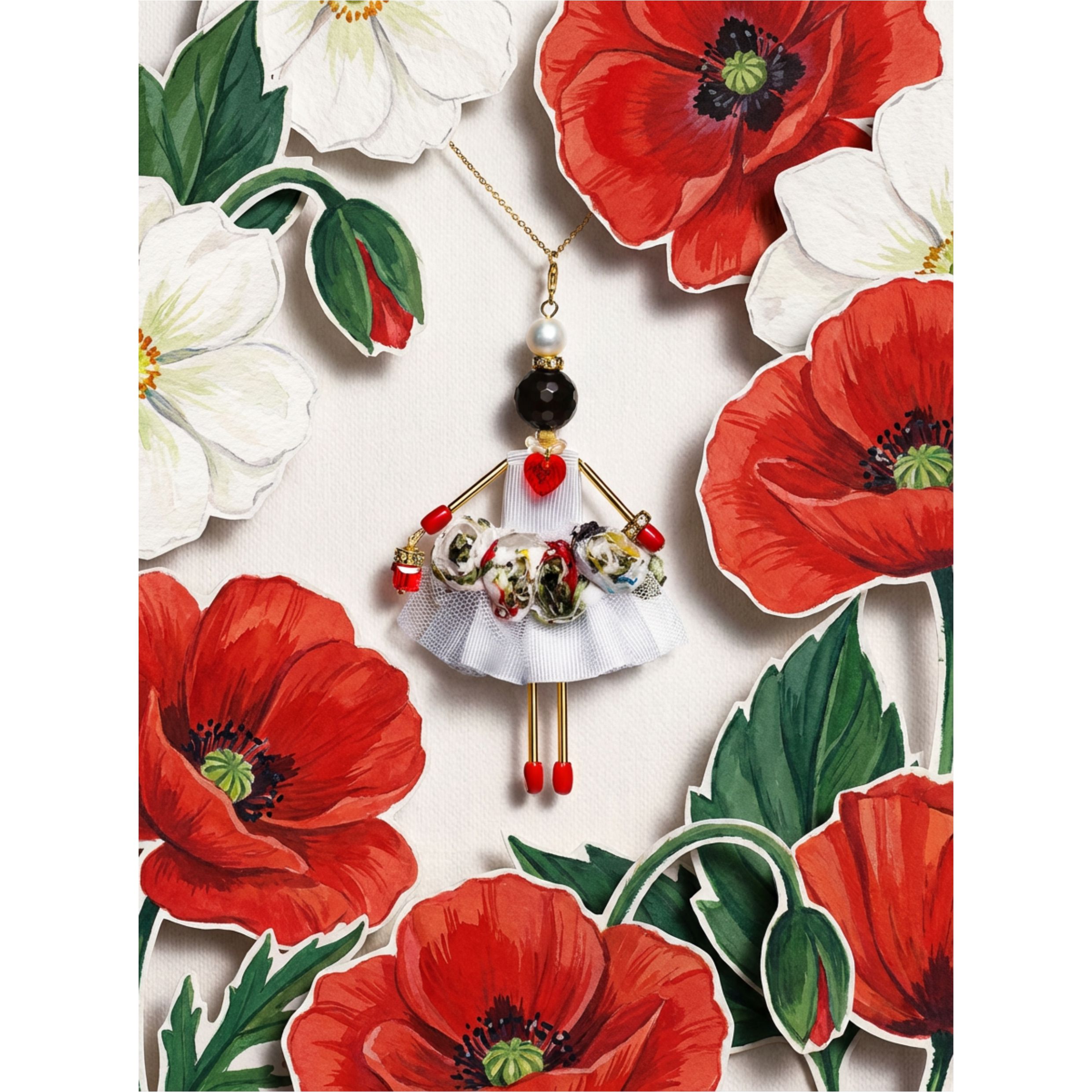 doll pendant with black agate — symbol of strength from the “Celebration” collection