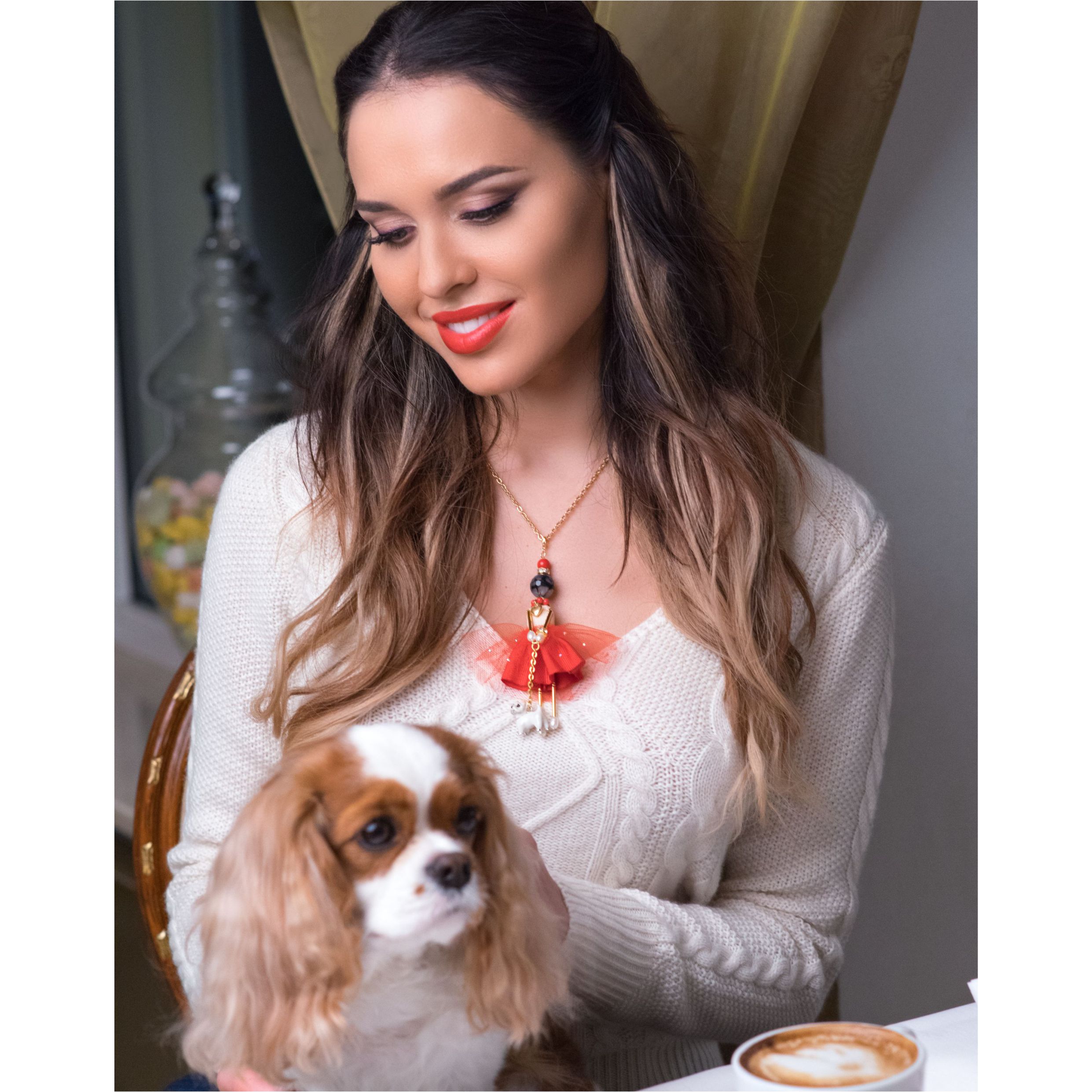 emotional scene: model with doll pendant and puppy from the “Devotion” collection