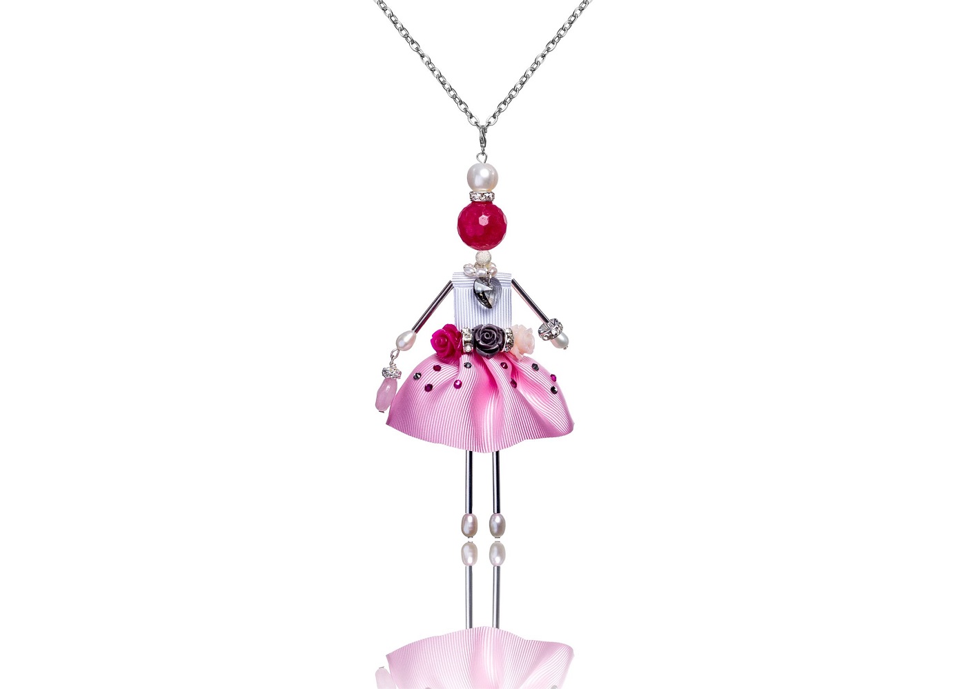 doll pendant in a pink skirt with pink agate from the “Malachite Box” collection
