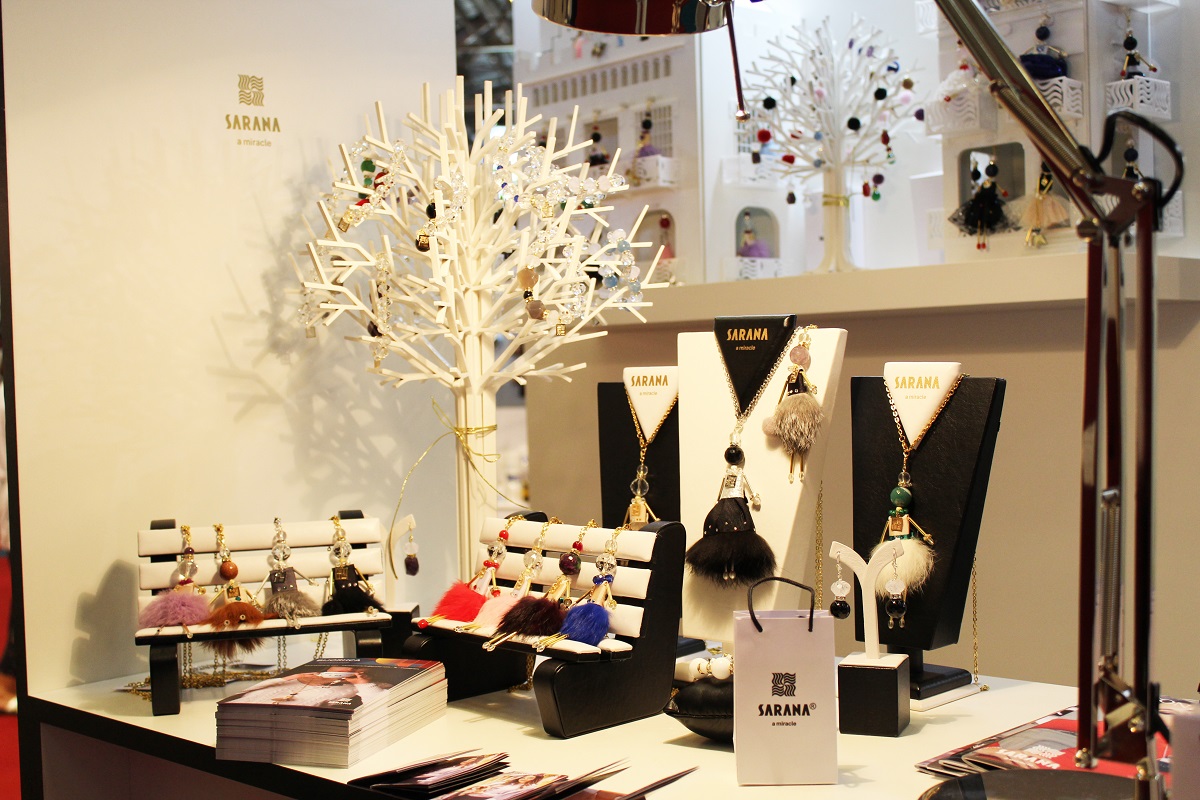 Urban benches displaying SARANA® designer jewelry — jewelry doll pendants from the “Crystal Symphony” collection